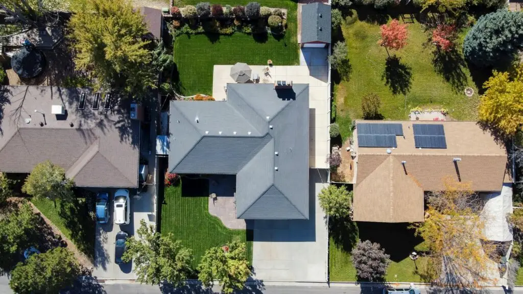 An experienced roofing crew installing high-quality asphalt shingles on a home in South Jordan, Utah.