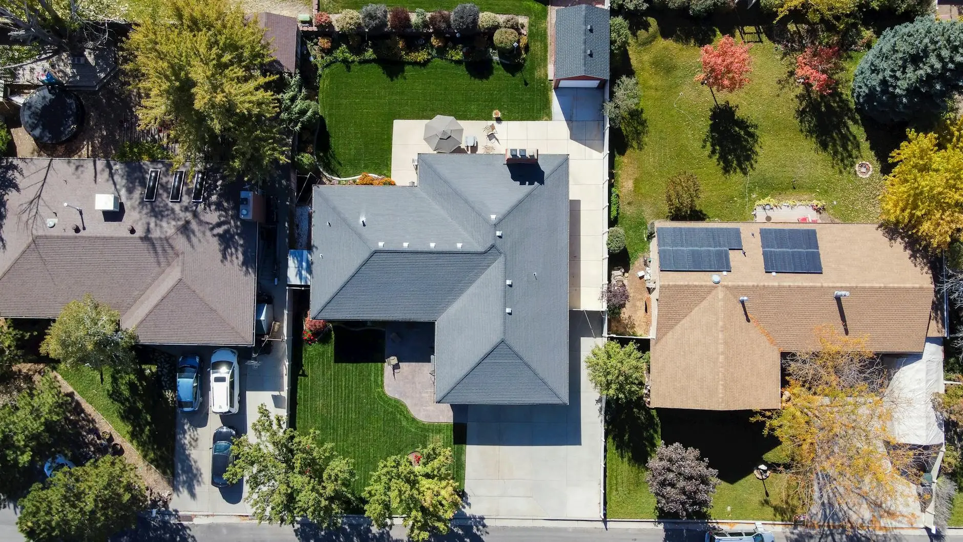 An experienced roofing crew installing high-quality asphalt shingles on a home in South Jordan, Utah.
