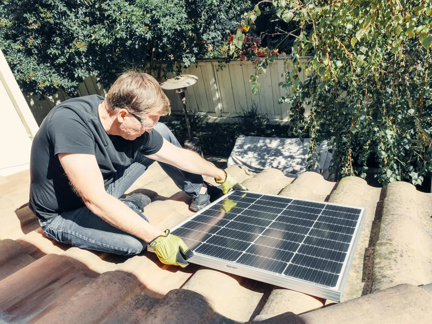 A professional roofing crew installing high-quality architectural shingles on a residential roof in West Jordan, Utah.
